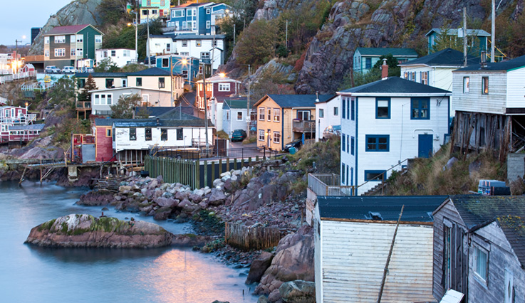 Newfoundland houses on cliff over ocean