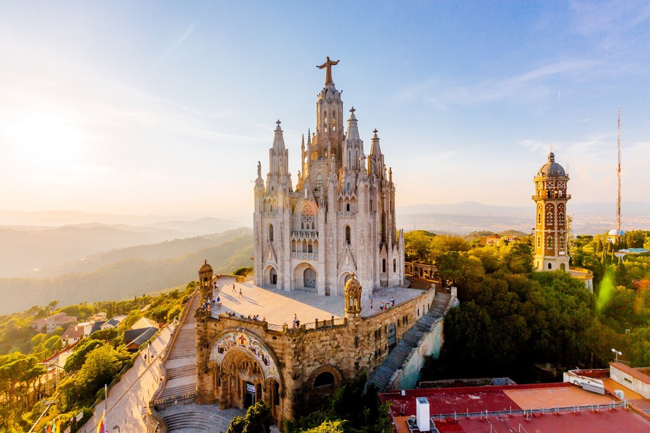 Aerial view of Barcelona skyline with Sagrat Cor temple, Catalonia, Spain