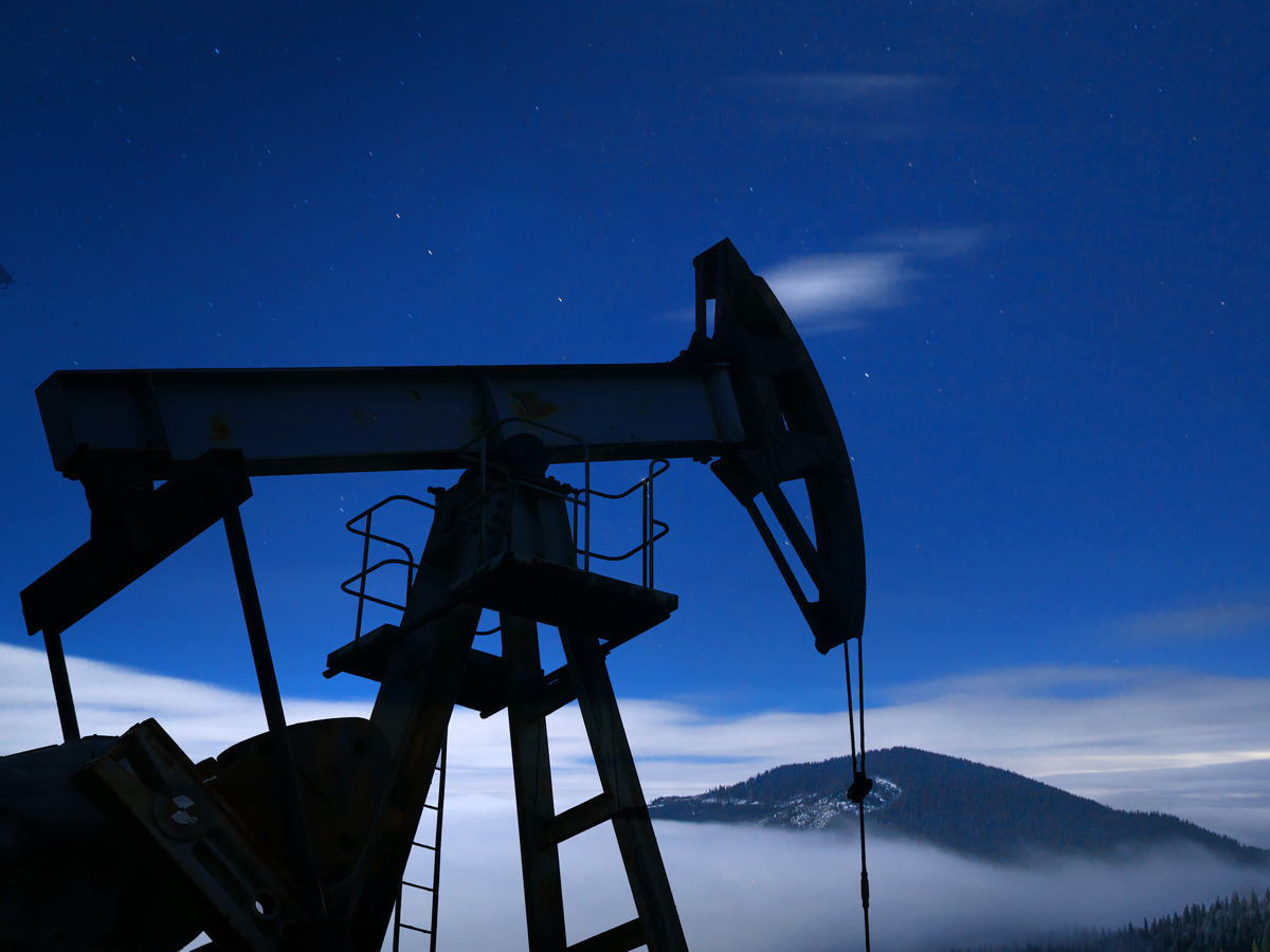 Oil rig in the night sky